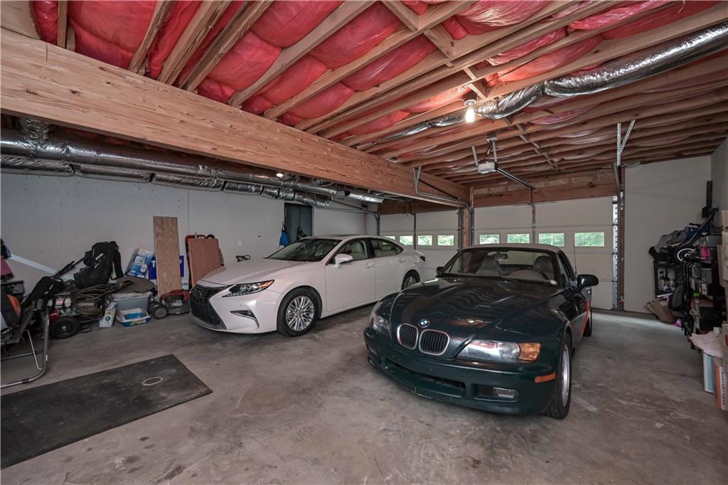 5885 West Chapel Hill Road Douglasville, GA 30135 - Photo 36 of 42 a car parked in a garage