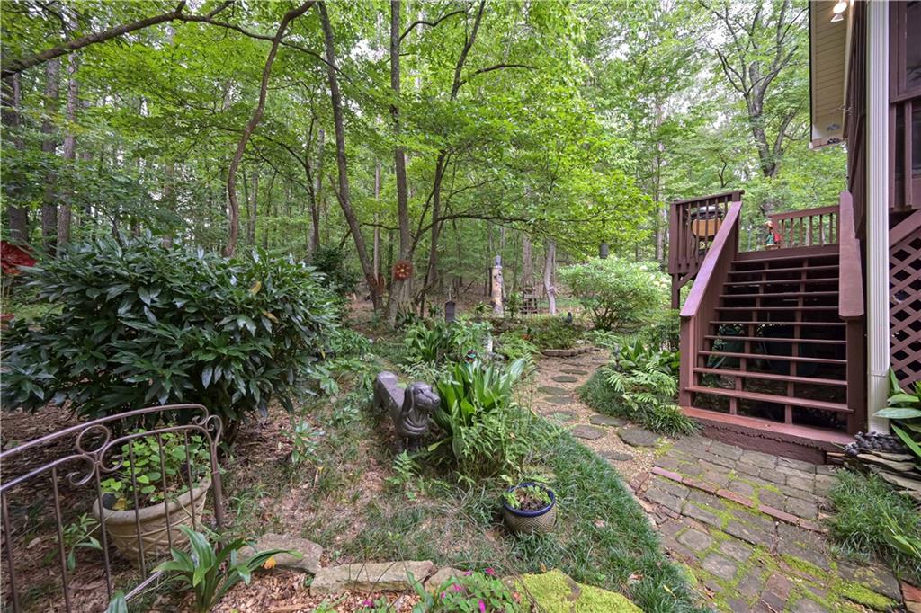 5885 West Chapel Hill Road Douglasville, GA 30135 - Photo 38 of 42 a view of a backyard with plants and garden