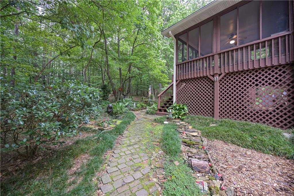 5885 West Chapel Hill Road Douglasville, GA 30135 - Photo 39 of 42 a view of a backyard with pathway