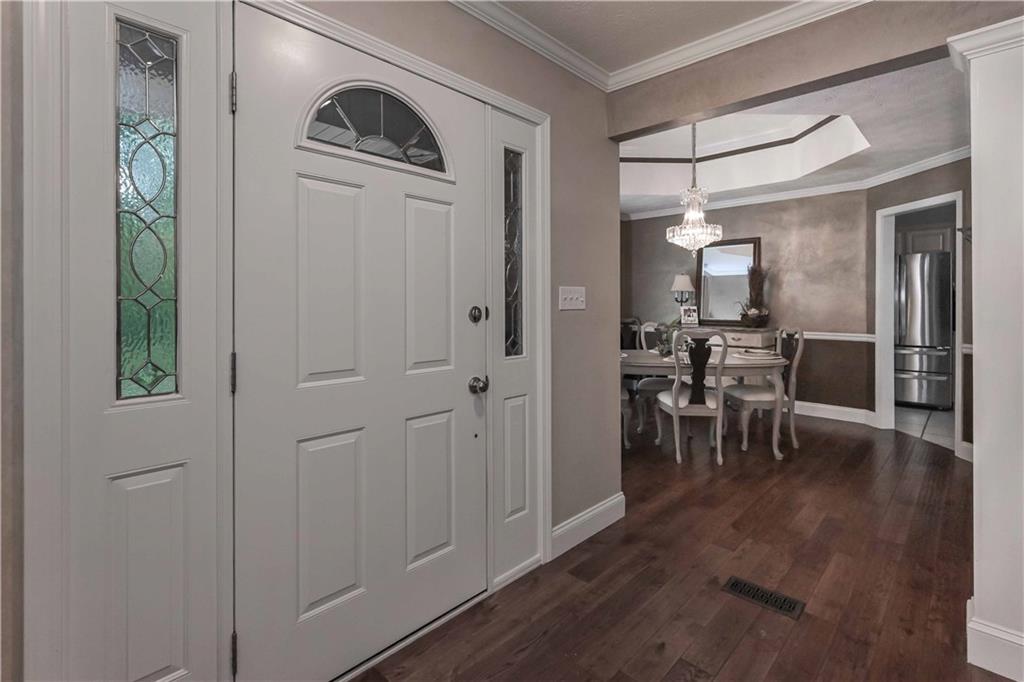 5885 West Chapel Hill Road Douglasville, GA 30135 - Photo 6 of 42 a view of a livingroom with furniture and hardwood floor