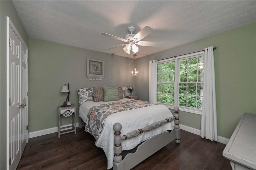 5885 West Chapel Hill Road Douglasville, GA 30135 - Photo 8 of 42 a bedroom with a bed and a window