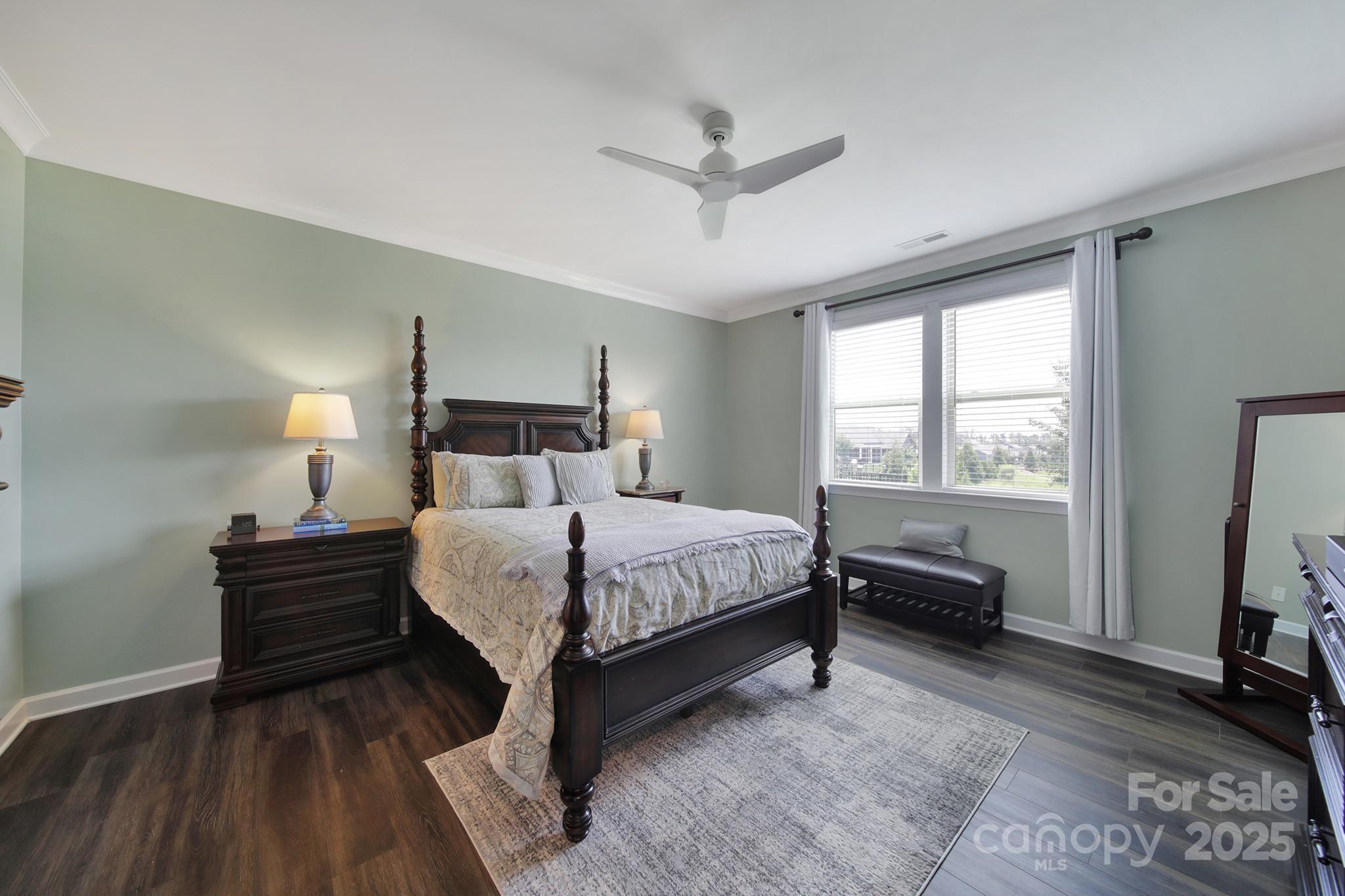 537 Lincoln Quarters Lane Fort Mill, SC 29708 - Photo 20 of 42 a bed sitting in a bedroom next to a window