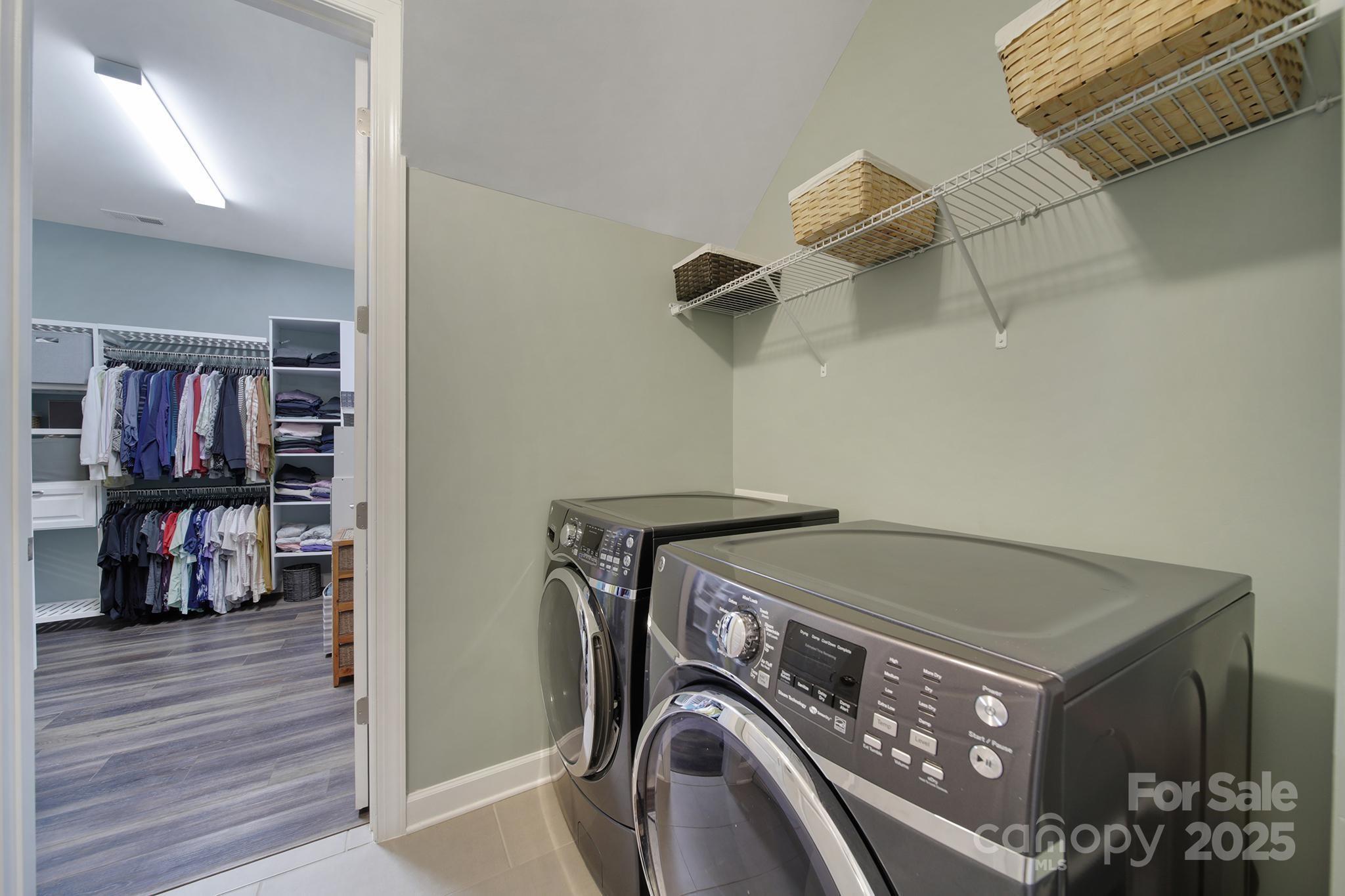 537 Lincoln Quarters Lane Fort Mill, SC 29708 - Photo 26 of 42 a utility room with dryer and washer