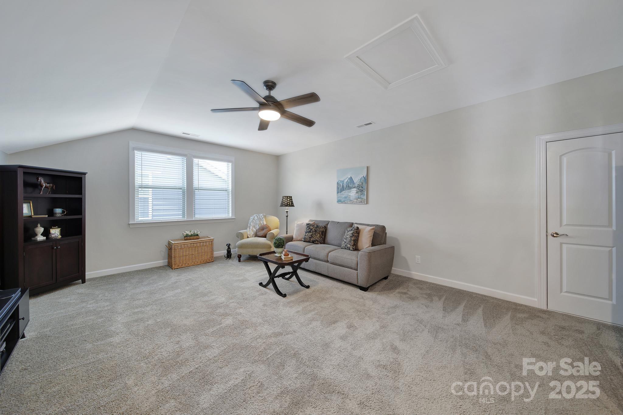 537 Lincoln Quarters Lane Fort Mill, SC 29708 - Photo 28 of 42 a living room with furniture and a window