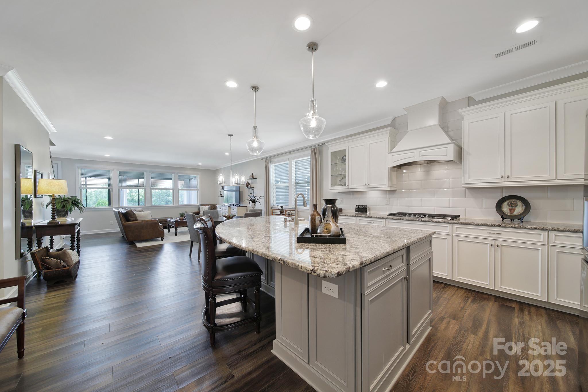 537 Lincoln Quarters Lane Fort Mill, SC 29708 - Photo 3 of 42 a kitchen with counter space sink appliances and cabinets