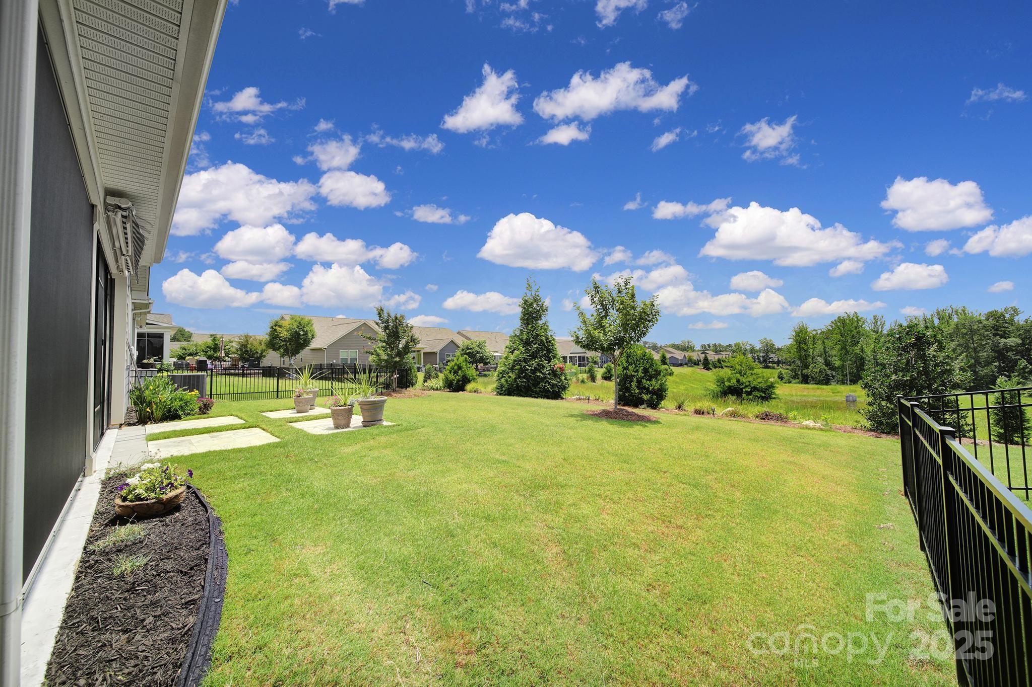 537 Lincoln Quarters Lane Fort Mill, SC 29708 - Photo 36 of 42 a view of a yard with swimming pool