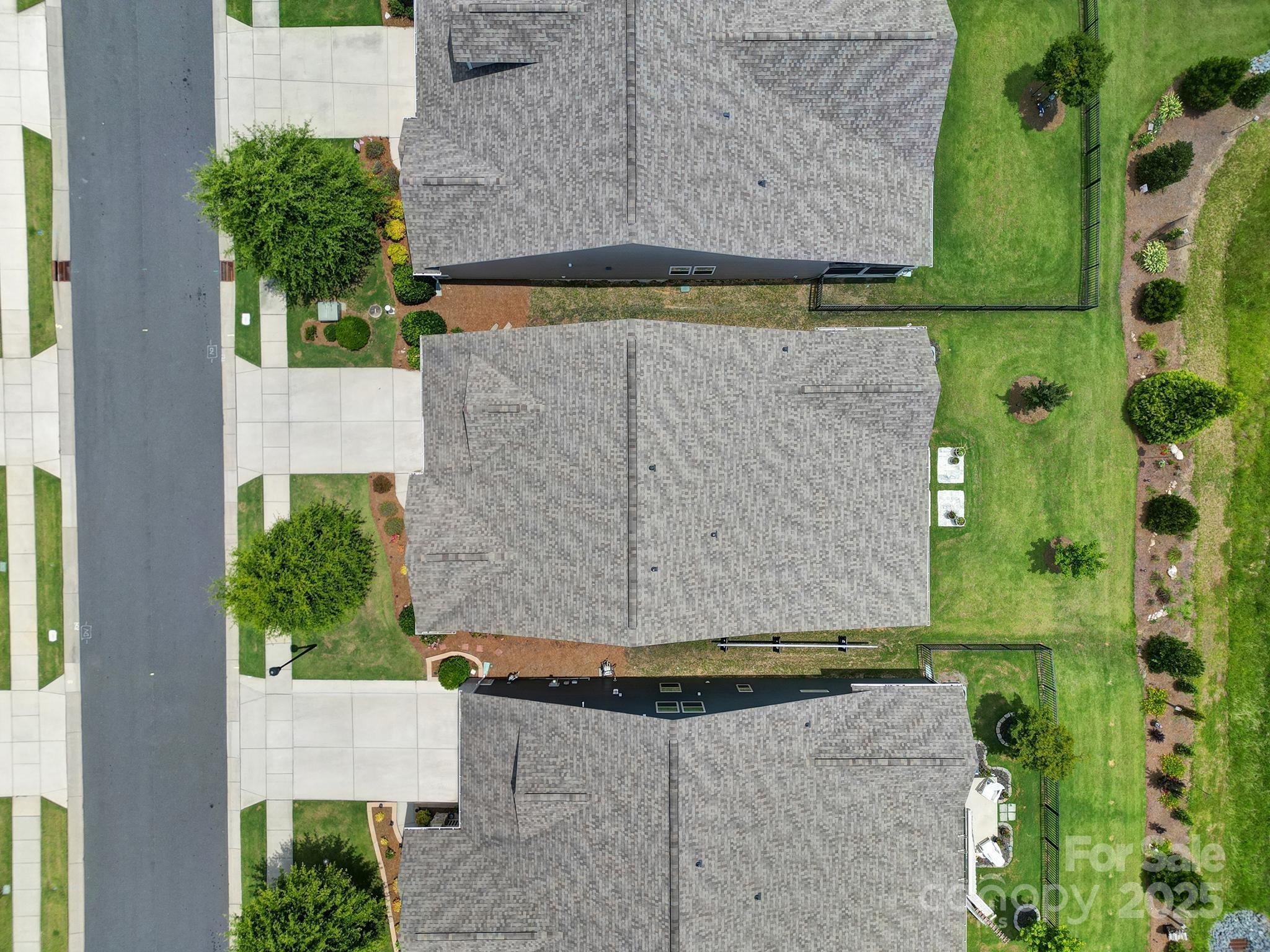 537 Lincoln Quarters Lane Fort Mill, SC 29708 - Photo 38 of 42 an aerial view of a house with a yard and large tree