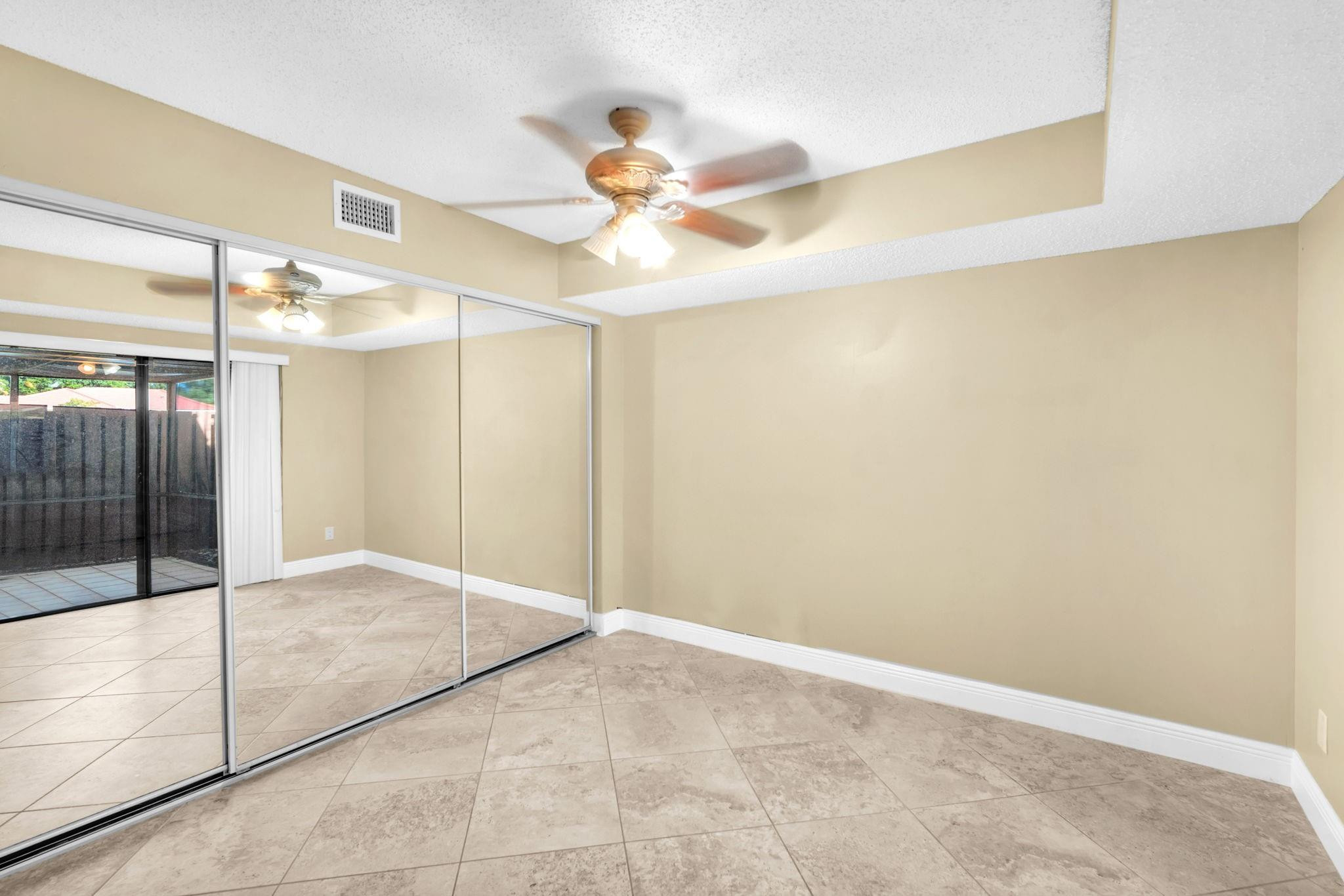 8377 Boca Rio Drive, Unit 8377 Boca Raton, FL 33433 - Photo 14 of 33 DOWNSTAIRS BEDROOM & CLOSET.