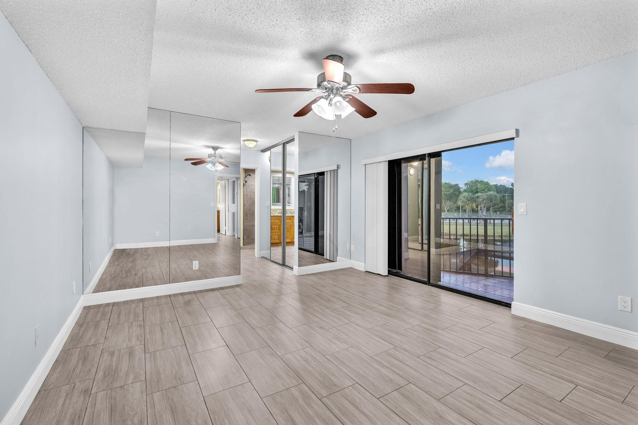 8377 Boca Rio Drive, Unit 8377 Boca Raton, FL 33433 - Photo 19 of 33 MASTER BEDROOM UPSTAIRS
