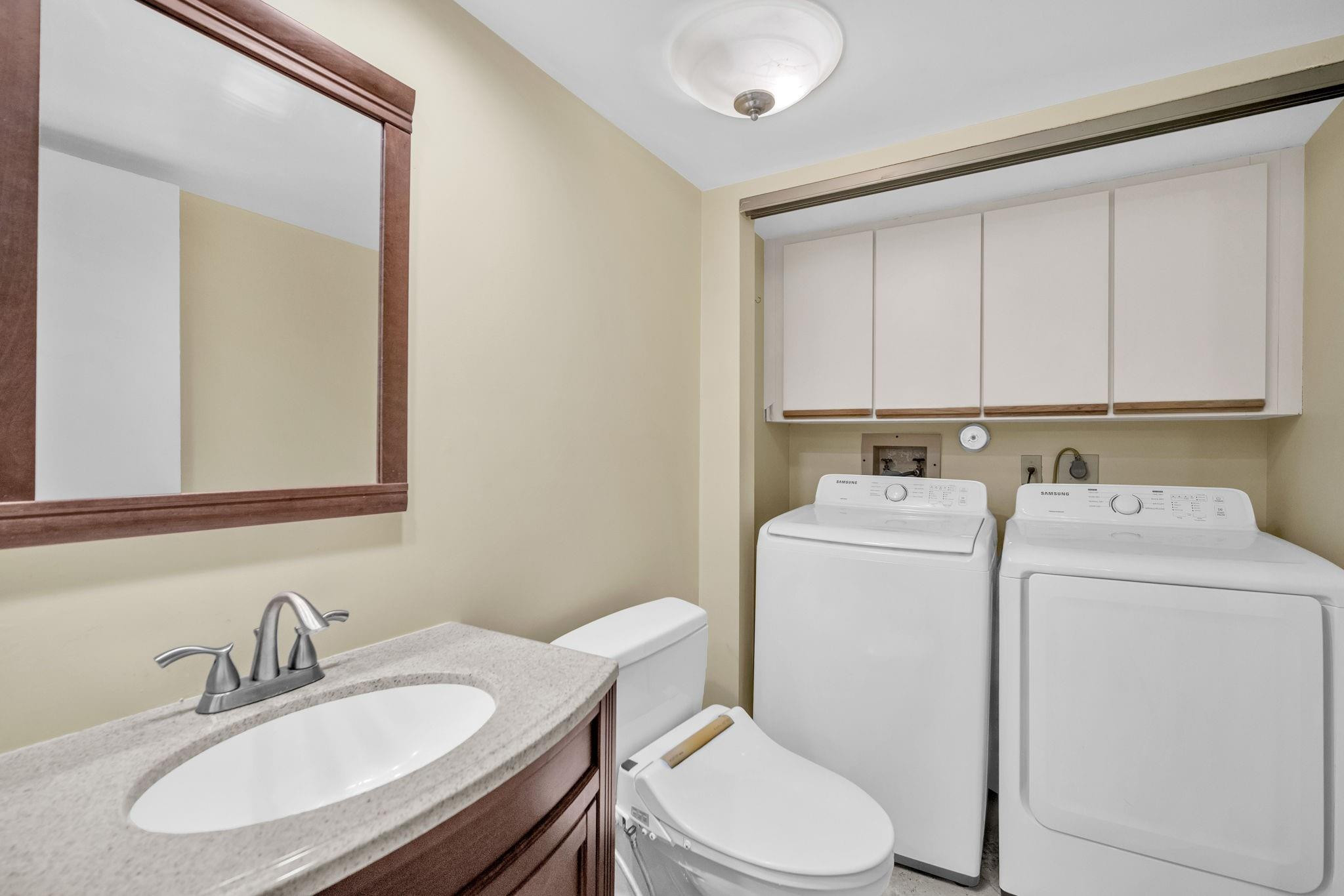 8377 Boca Rio Drive, Unit 8377 Boca Raton, FL 33433 - Photo 9 of 33 HALF BATHROOM DOWNSTAIRS