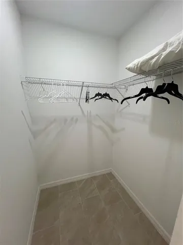 an empty room with water view