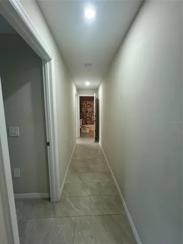 a view of a door and tree in a room