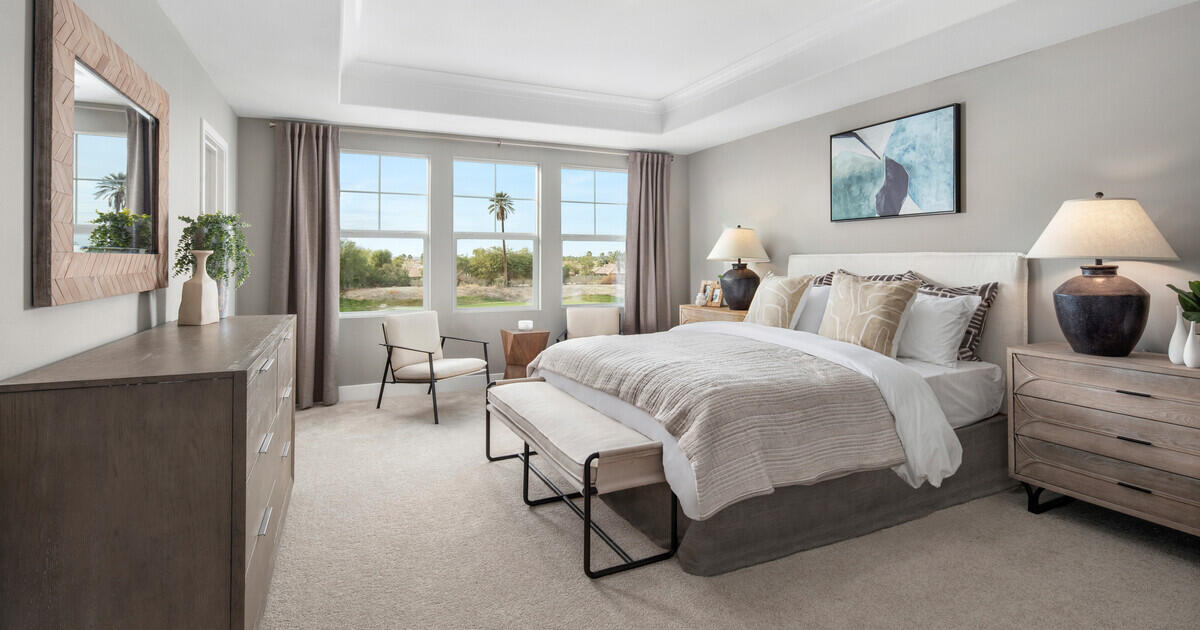 42401 Lamporo Way Indio, CA 92203 - Photo 12 of 15 a spacious bedroom with a bed and a large window