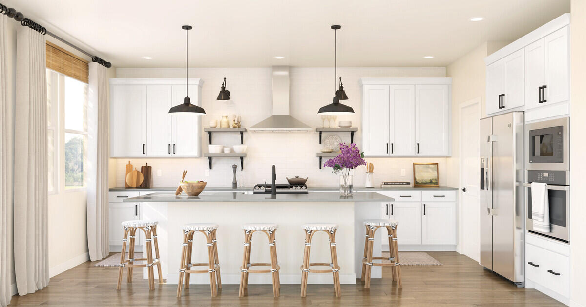 42401 Lamporo Way Indio, CA 92203 - Photo 2 of 15 a kitchen with stainless steel appliances kitchen island granite countertop a table chairs and a sink