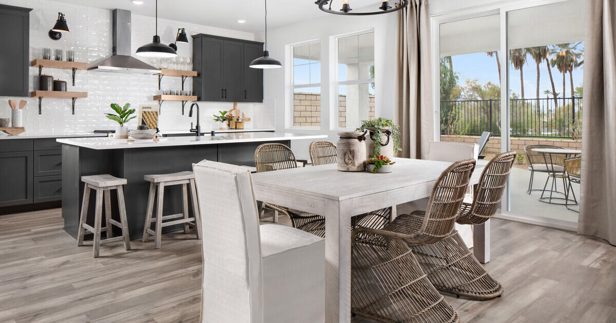 42401 Lamporo Way Indio, CA 92203 - Photo 8 of 15 a view of a dining room with furniture window and wooden floor