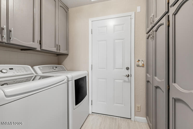 675 College Drive Reno, NV 89503 - Photo 16 of 30 a utility room with dryer and washer
