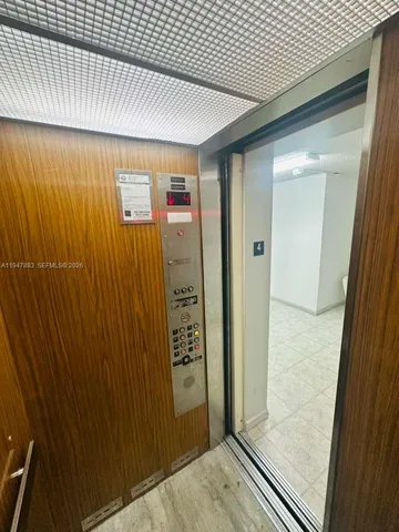 a view of a livingroom with furniture and a fireplace