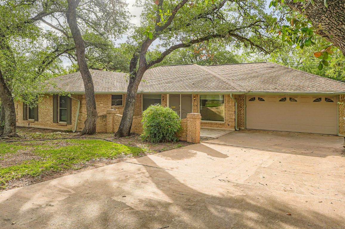 a house with a tree in front of it