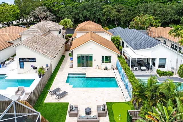 a backyard of a house with lots of green space