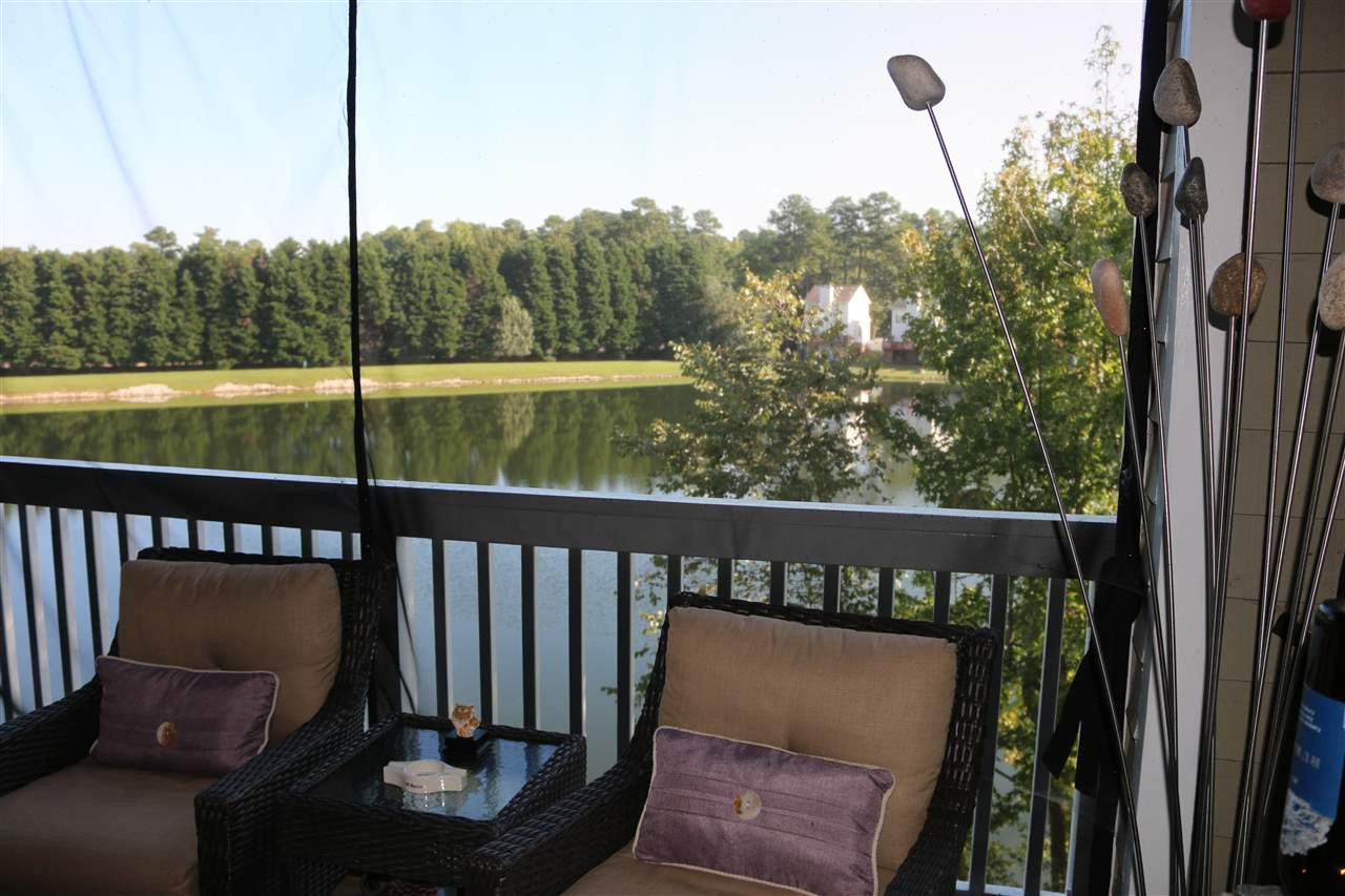 520 Springfork Drive, Unit 520 Cary, NC 27513 - Photo 22 of 25 Large Deck Overlooking Lake