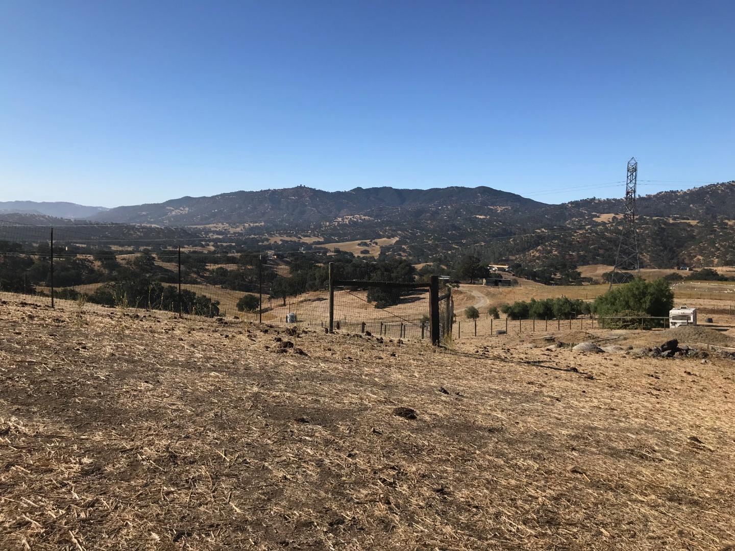 19967 Panoche Road Paicines, CA 95043 - Photo 27 of 33 a view of a lake with a mountain in the background