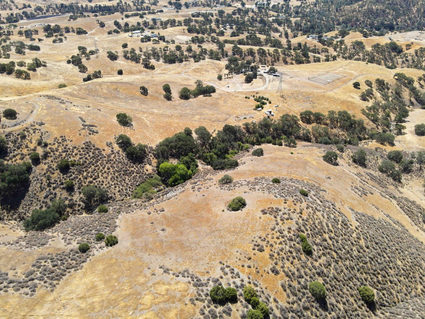 19967 Panoche Road Paicines, CA 95043 - Photo 6 of 33 a view of a backyard of snow on the road