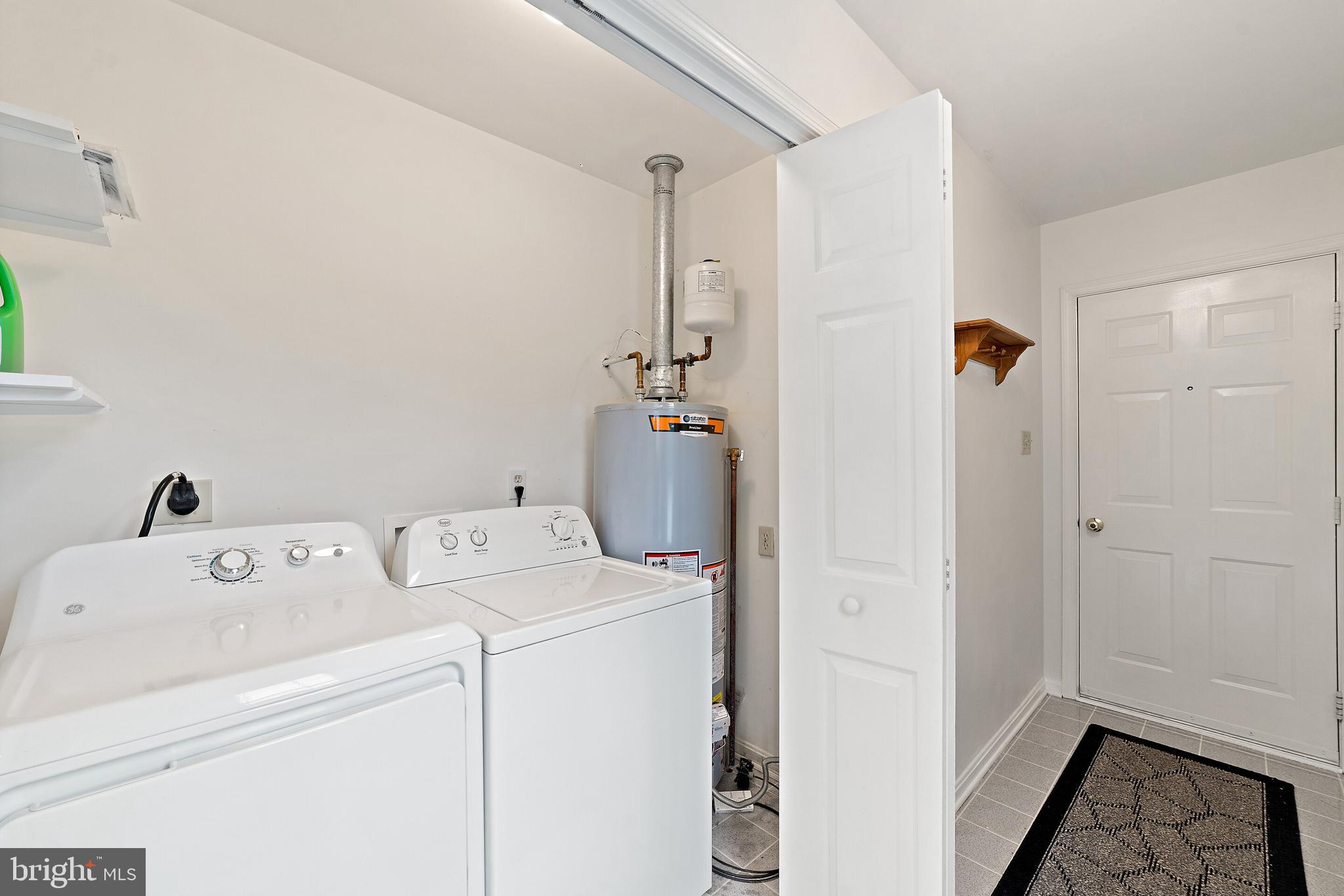 302 North Duey Road Remington, VA 22734 - Photo 24 of 34 Roper Washer/Dryer & mudroom hallway