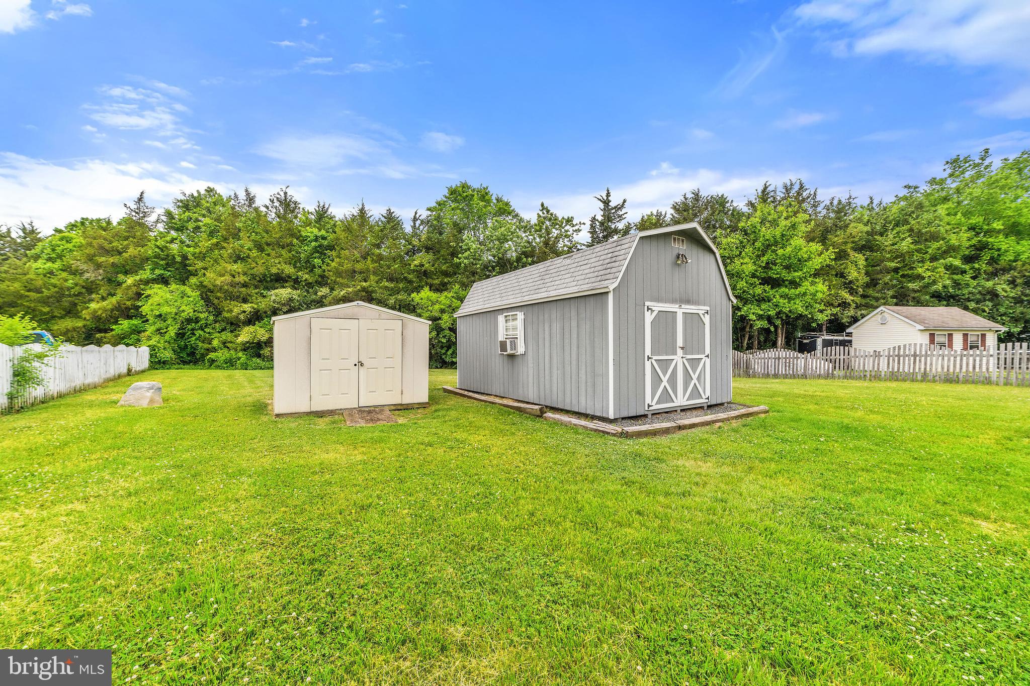 302 North Duey Road Remington, VA 22734 - Photo 32 of 34 backyard with extra metal storage shed