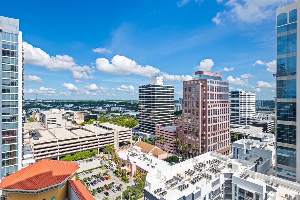 350 Southeast 2nd Street, Unit 2280 Fort Lauderdale, FL 33301 - Photo 24 of 25 a view of a balcony with two chairs and a potted plant