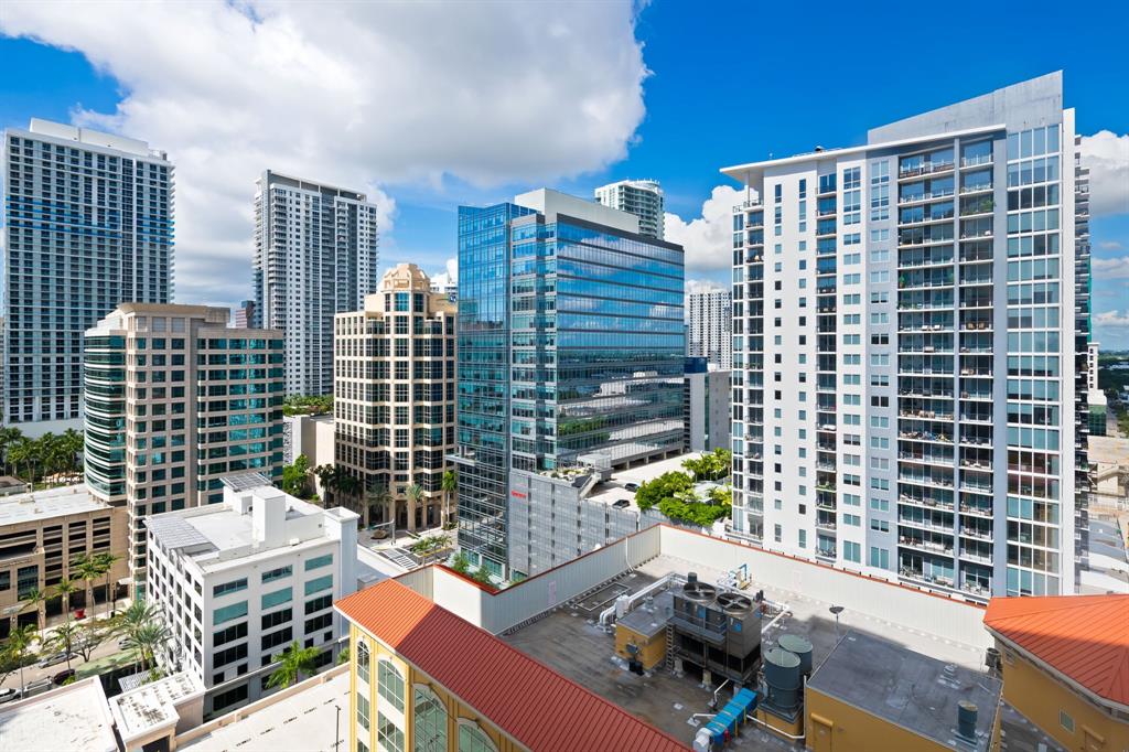 350 Southeast 2nd Street, Unit 2280 Fort Lauderdale, FL 33301 - Photo 25 of 25 a view of a patio with couches table and chairs and potted plants