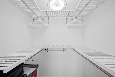 a view of a room with racks on the wall