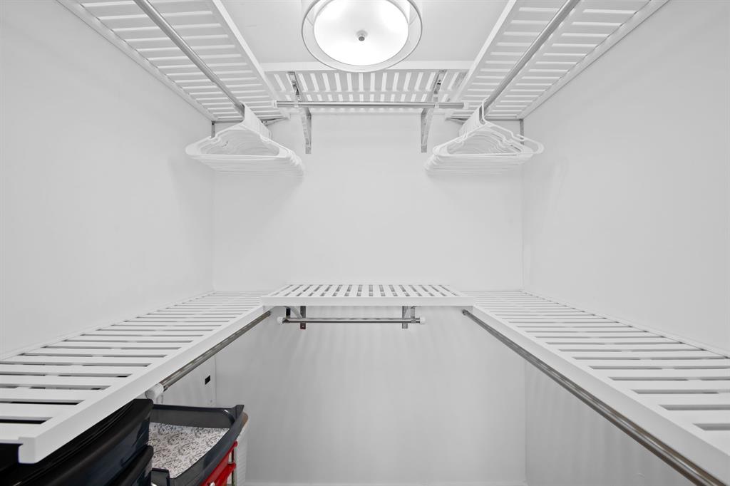 350 Southeast 2nd Street, Unit 2280 Fort Lauderdale, FL 33301 - Photo 7 of 25 a view of a room with racks on the wall