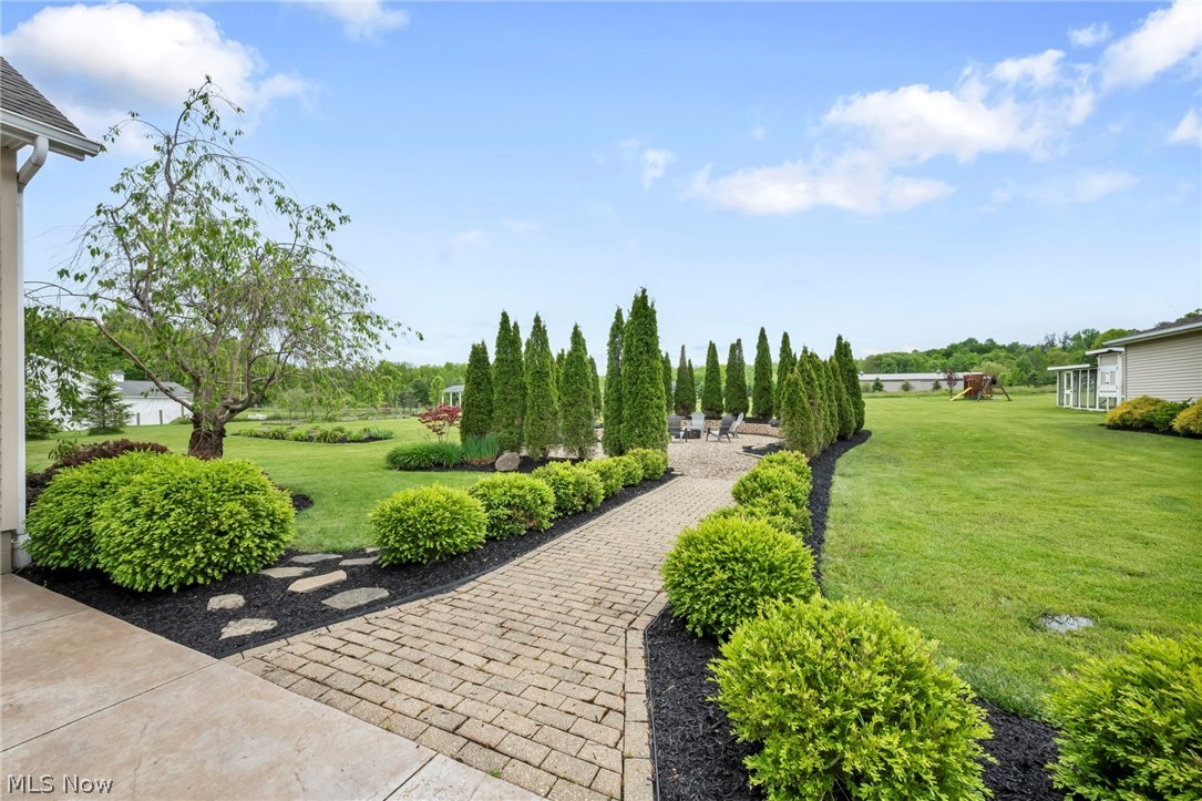 14353 Radcliffe Road Chardon, OH 44024 - Photo 8 of 50 walkway to firepit