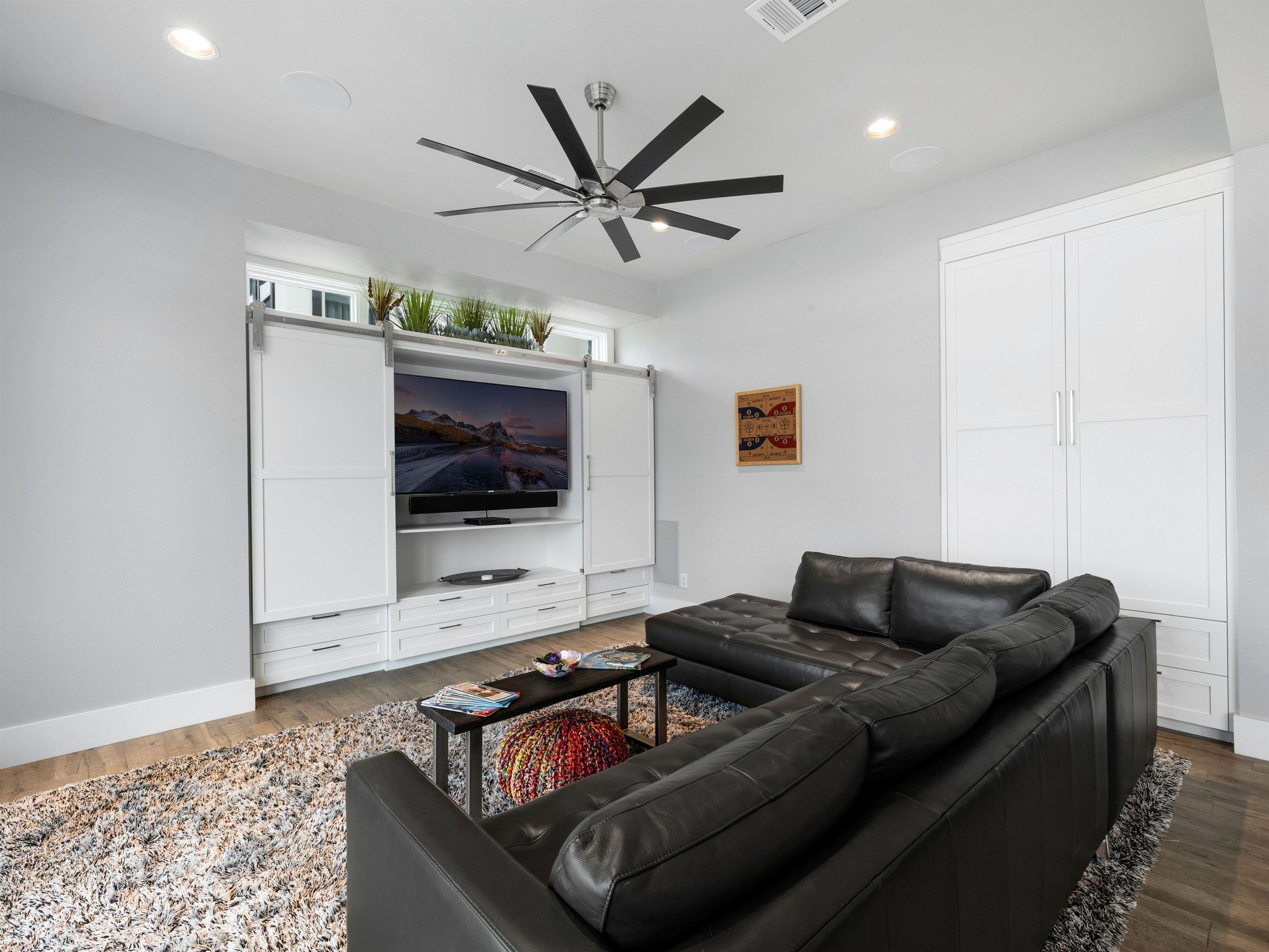 107 Paradise Point Kingsland, TX 78639 - Photo 13 of 40 a living room with furniture and a flat screen tv