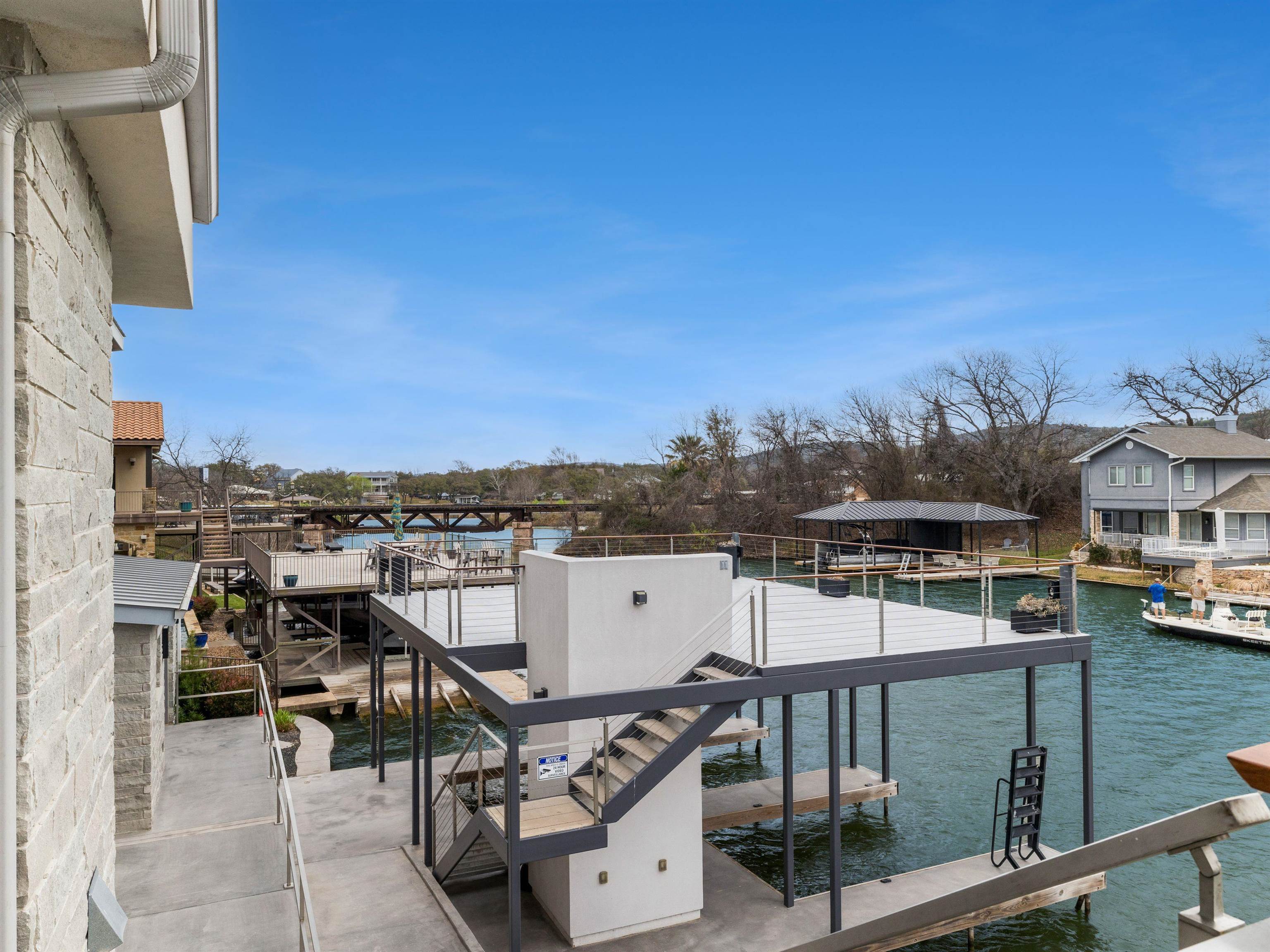 107 Paradise Point Kingsland, TX 78639 - Photo 16 of 40 a view of a balcony with chairs
