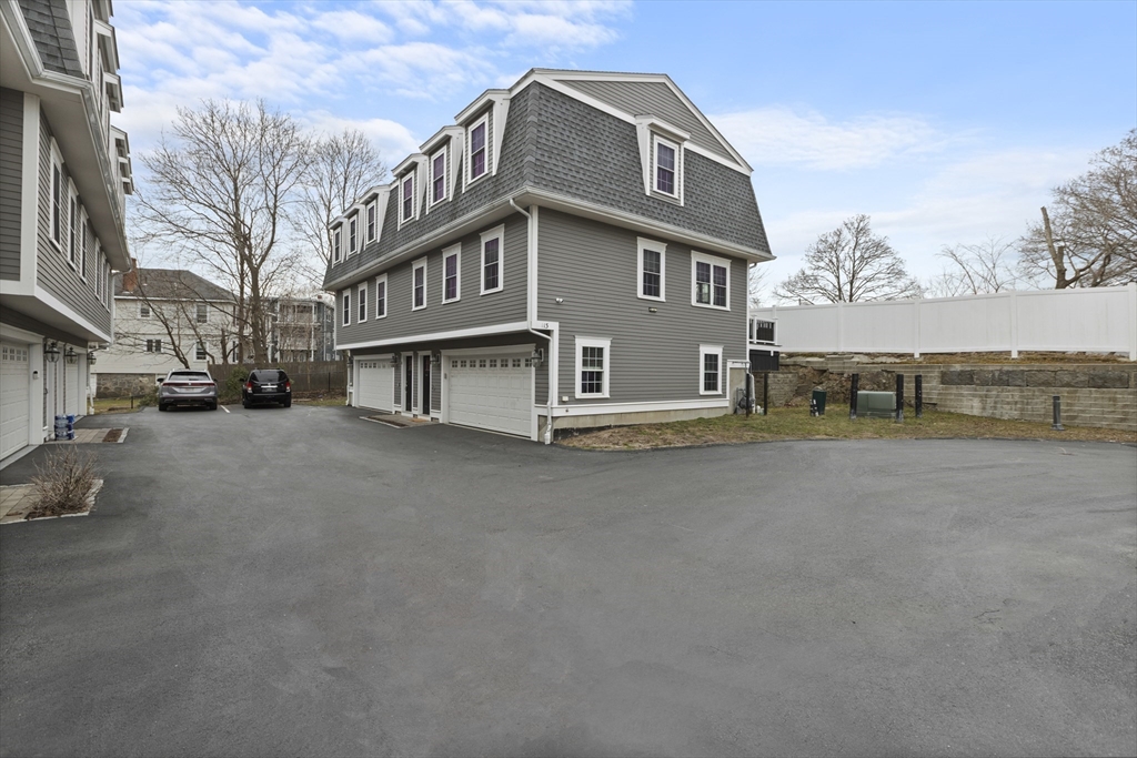 113 Elm Street, Unit D Quincy, MA 02169 - Photo 31 of 39 a view of a house with a street