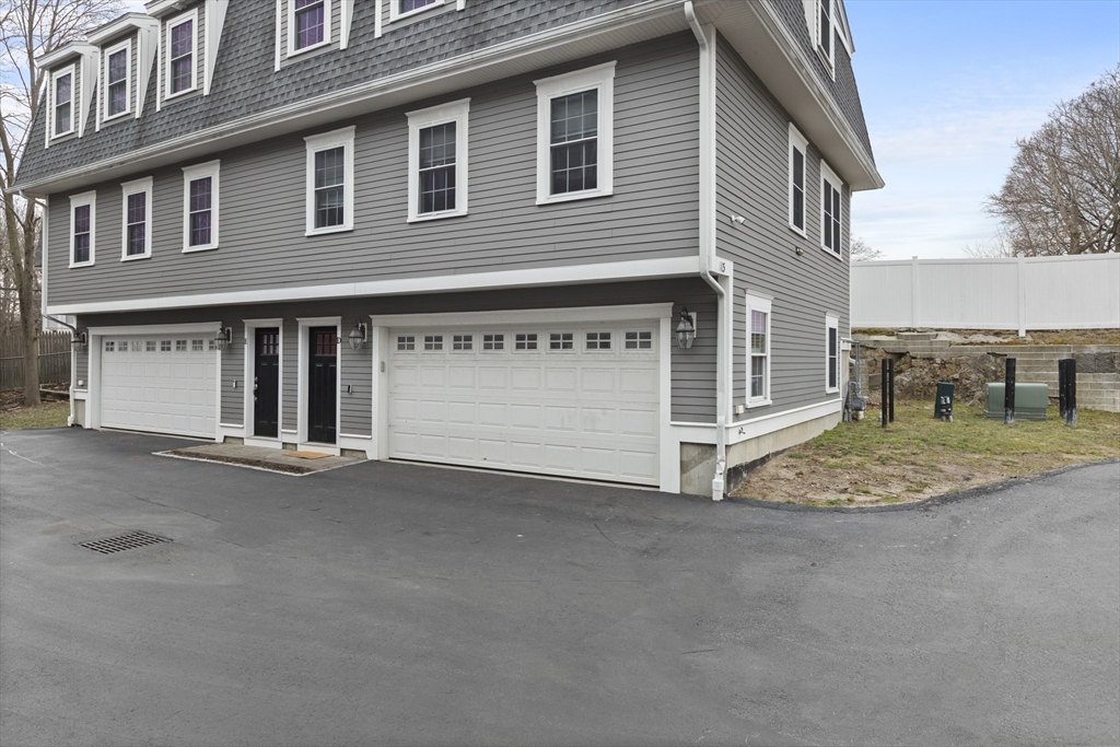 113 Elm Street, Unit D Quincy, MA 02169 - Photo 4 of 39 a view of a house with a outdoor space