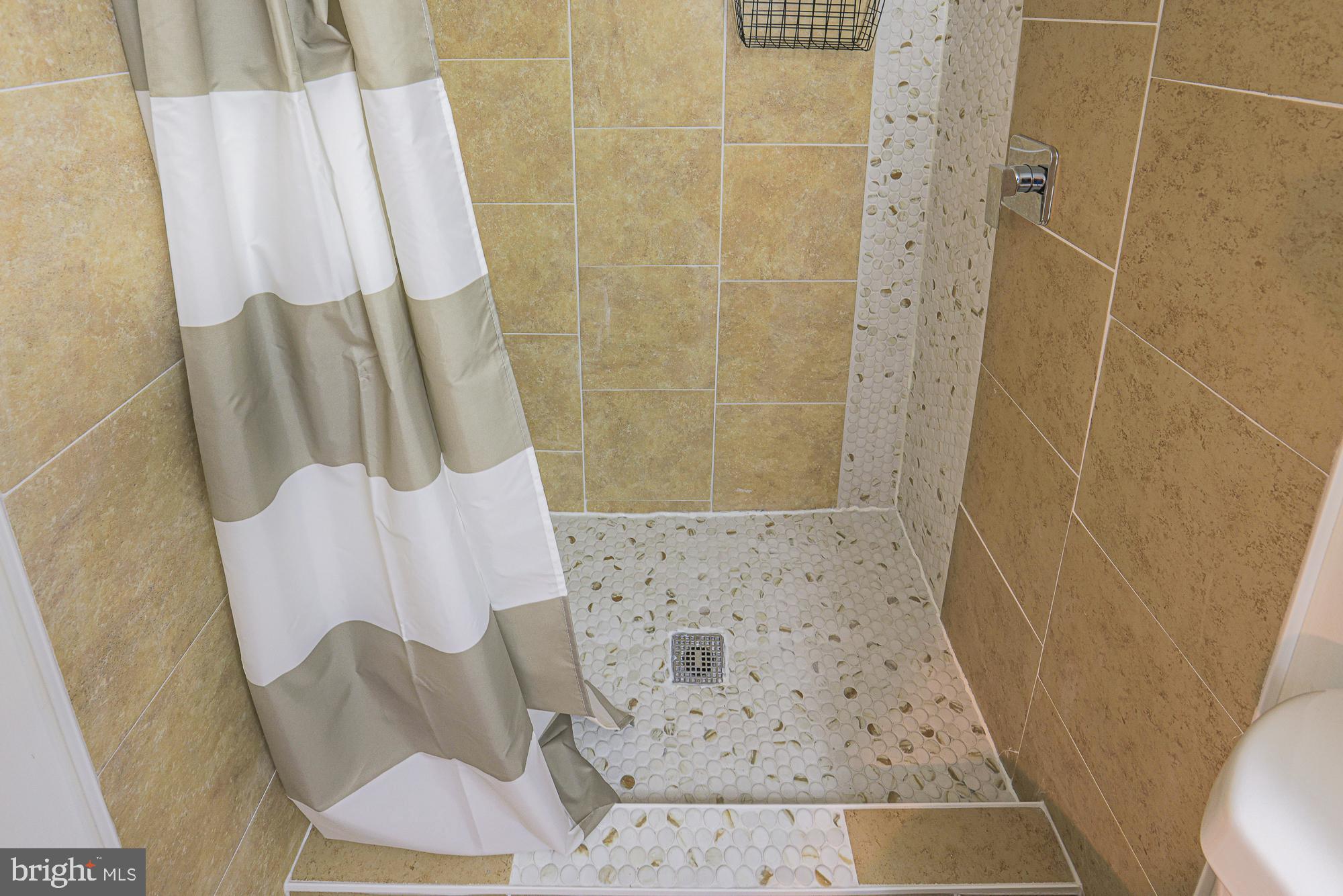 1909 Mosher Street Baltimore, MD 21217 - Photo 25 of 40 a bathroom with a sink and toilet