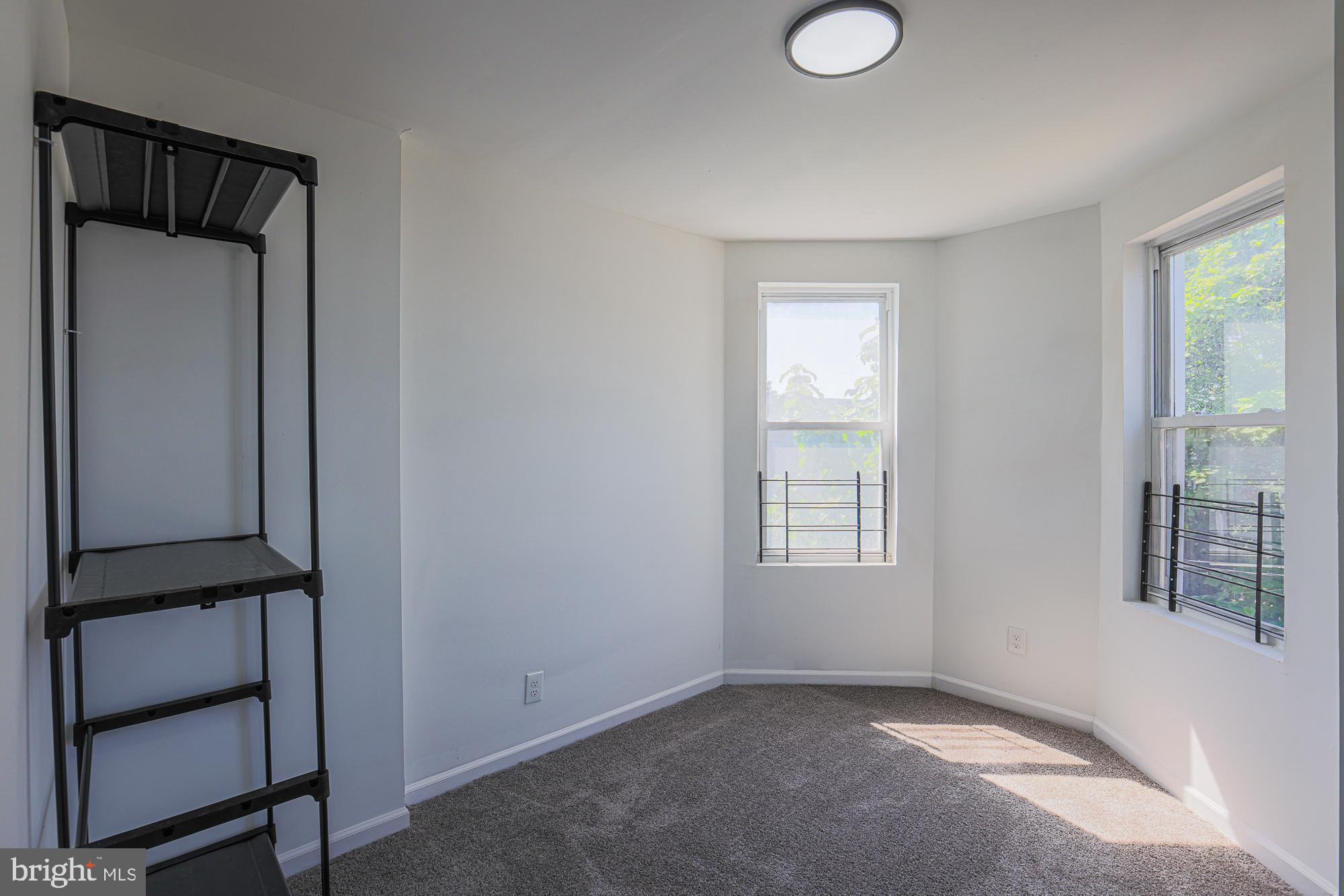 1909 Mosher Street Baltimore, MD 21217 - Photo 26 of 40 an empty room with windows