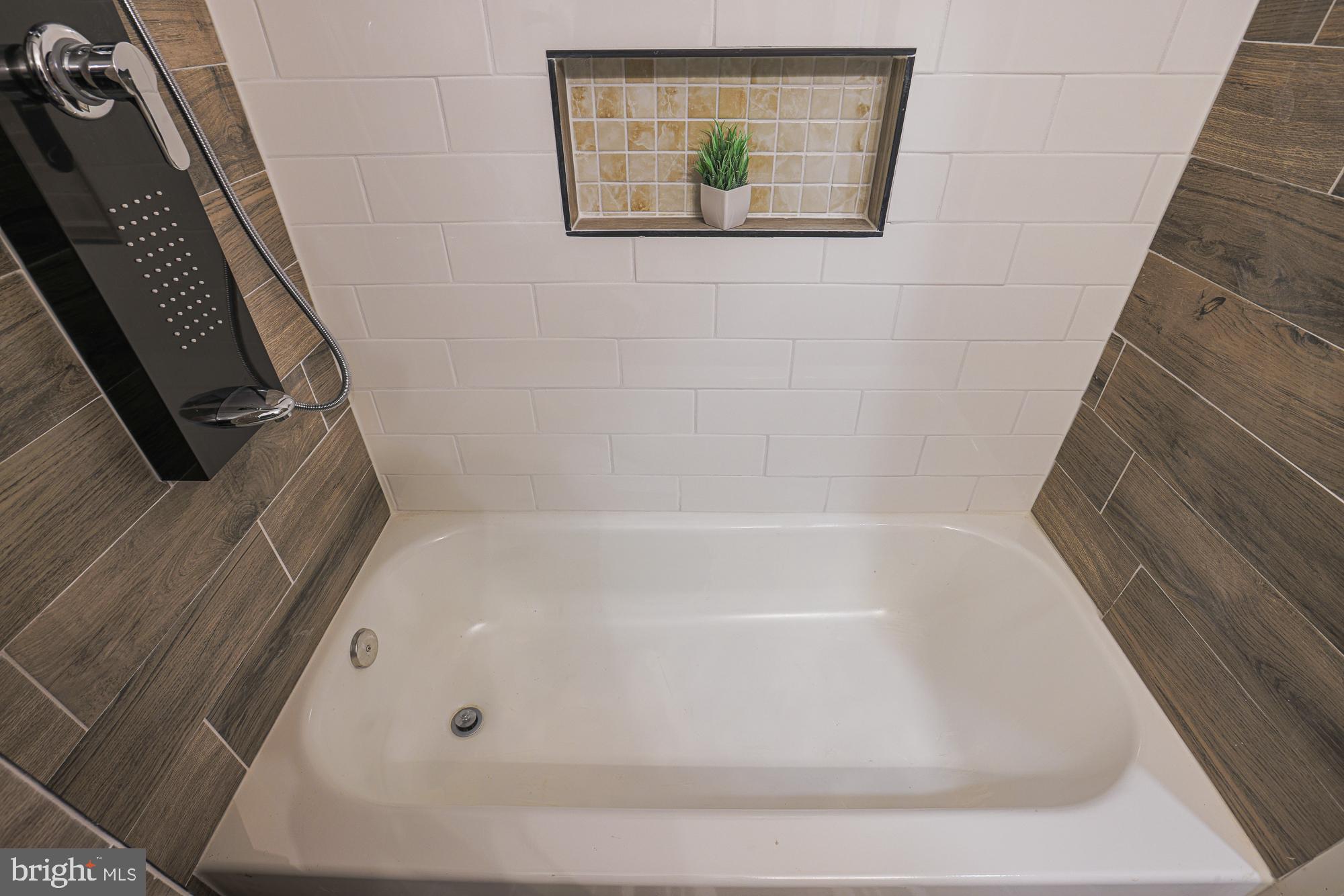 1909 Mosher Street Baltimore, MD 21217 - Photo 29 of 40 a close view of a bathtub in bathroom