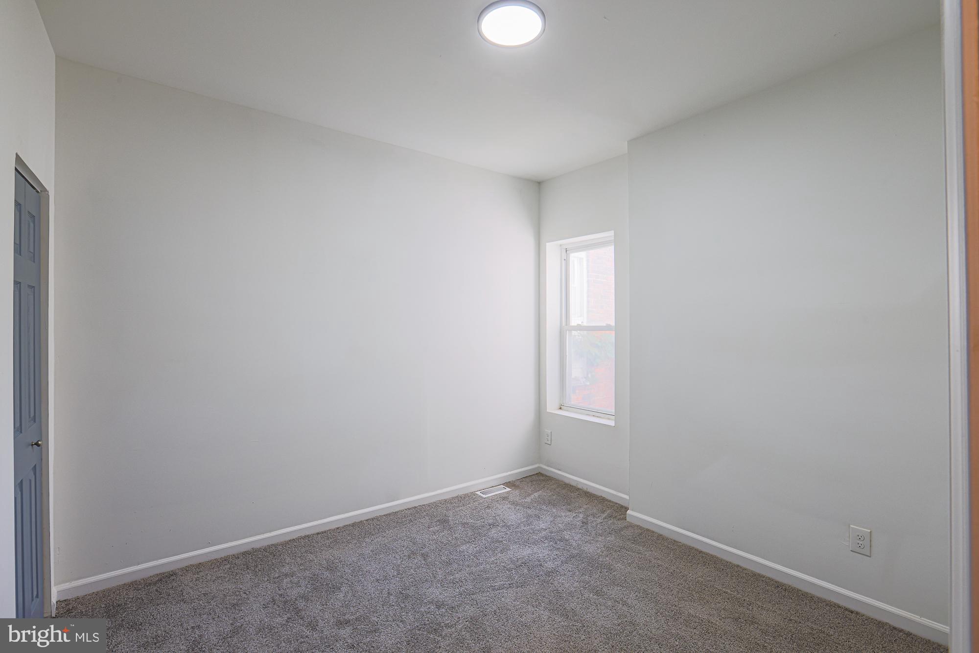 1909 Mosher Street Baltimore, MD 21217 - Photo 30 of 40 a view of an empty room and window