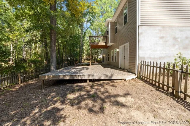 a view of a backyard with a small cabin
