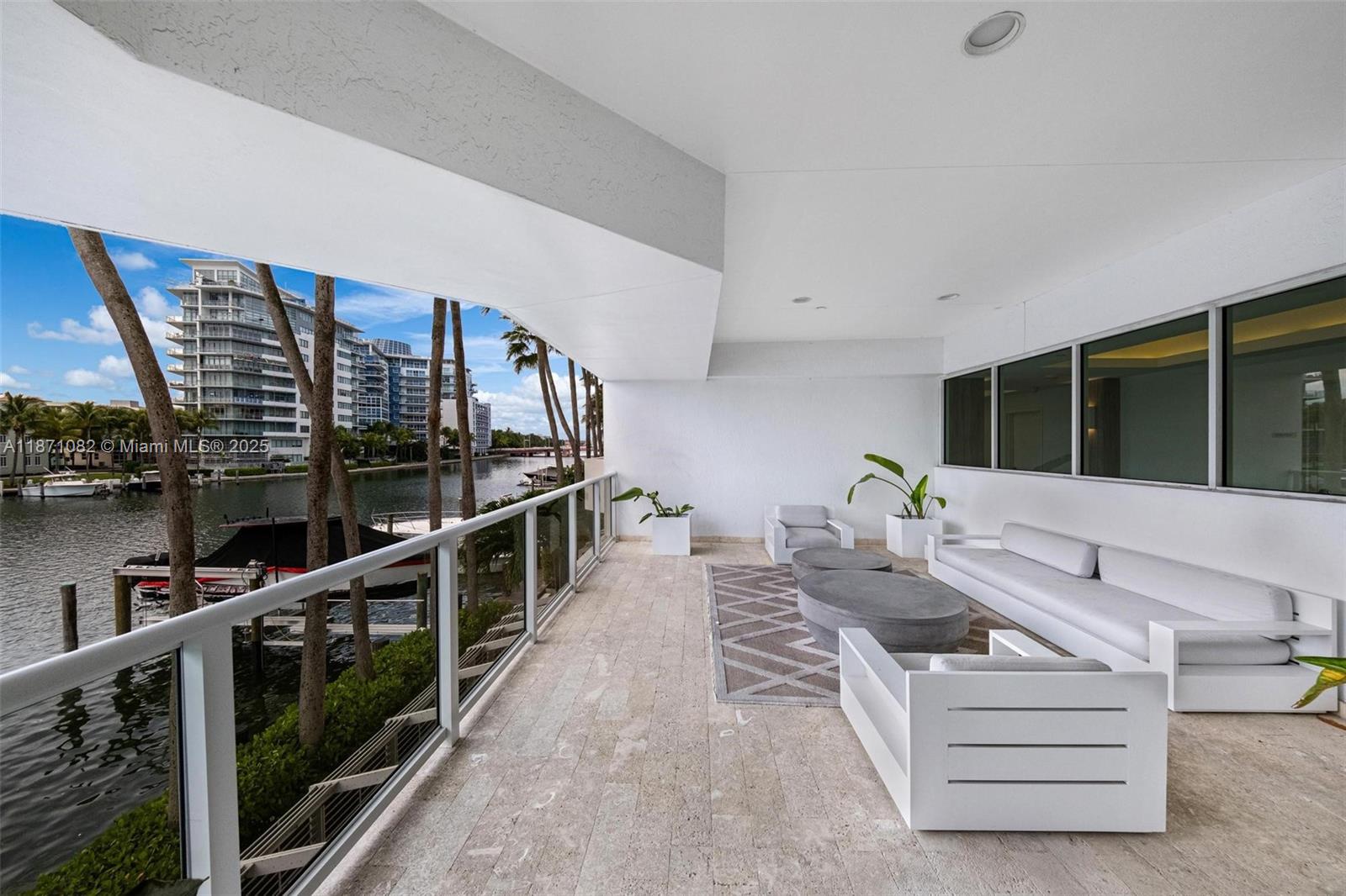5900 Collins Avenue, Unit 1905 Miami Beach, FL 33140 - Photo 19 of 22 a living room with furniture