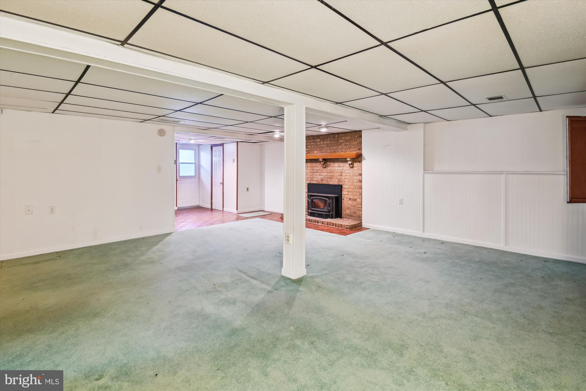1574 Melanie Road Pasadena, MD 21122 - Photo 25 of 41 a view of a livingroom with a fireplace and window