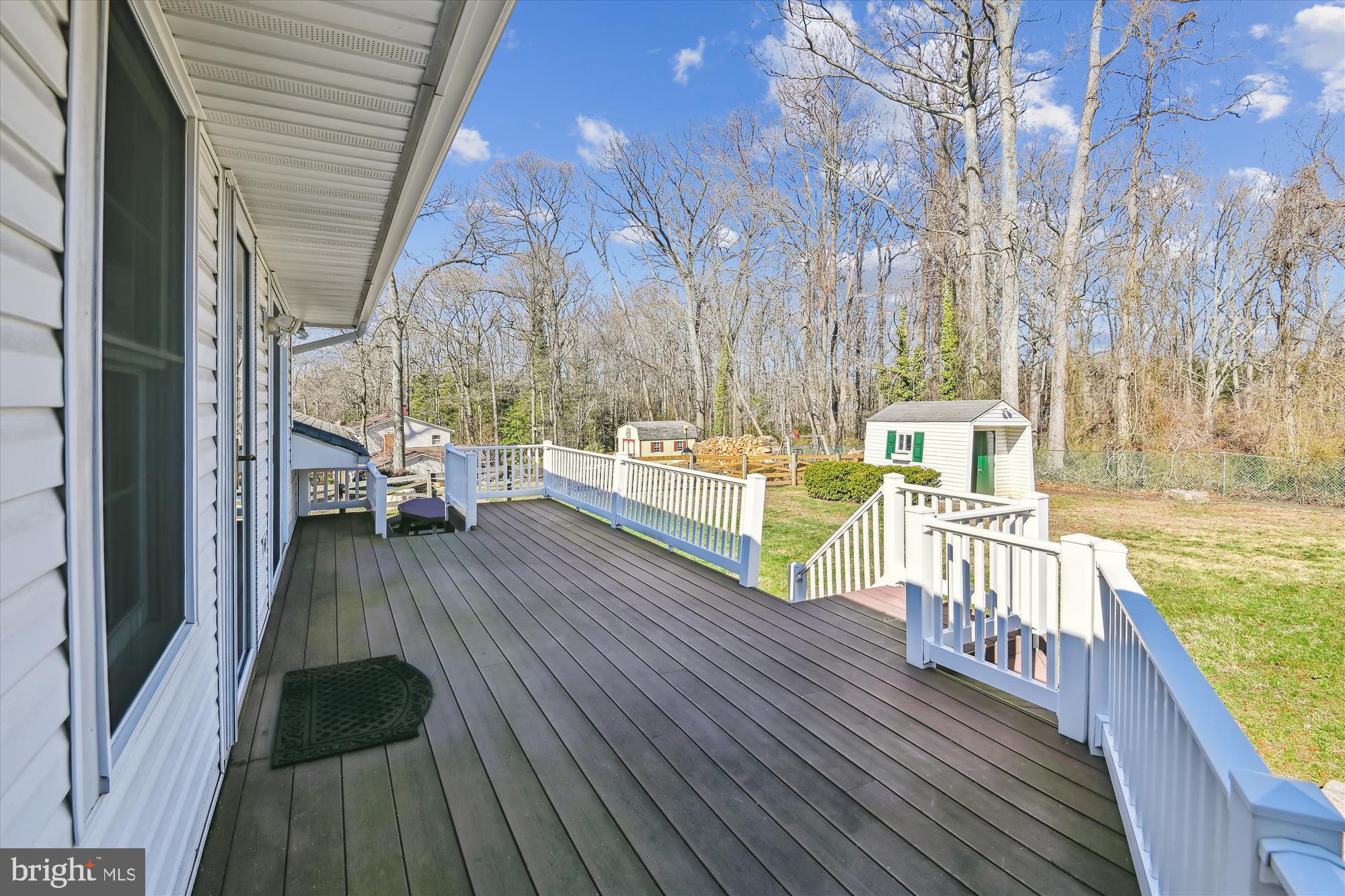 1574 Melanie Road Pasadena, MD 21122 - Photo 30 of 41 a view of a balcony with wooden floor and outdoor seating