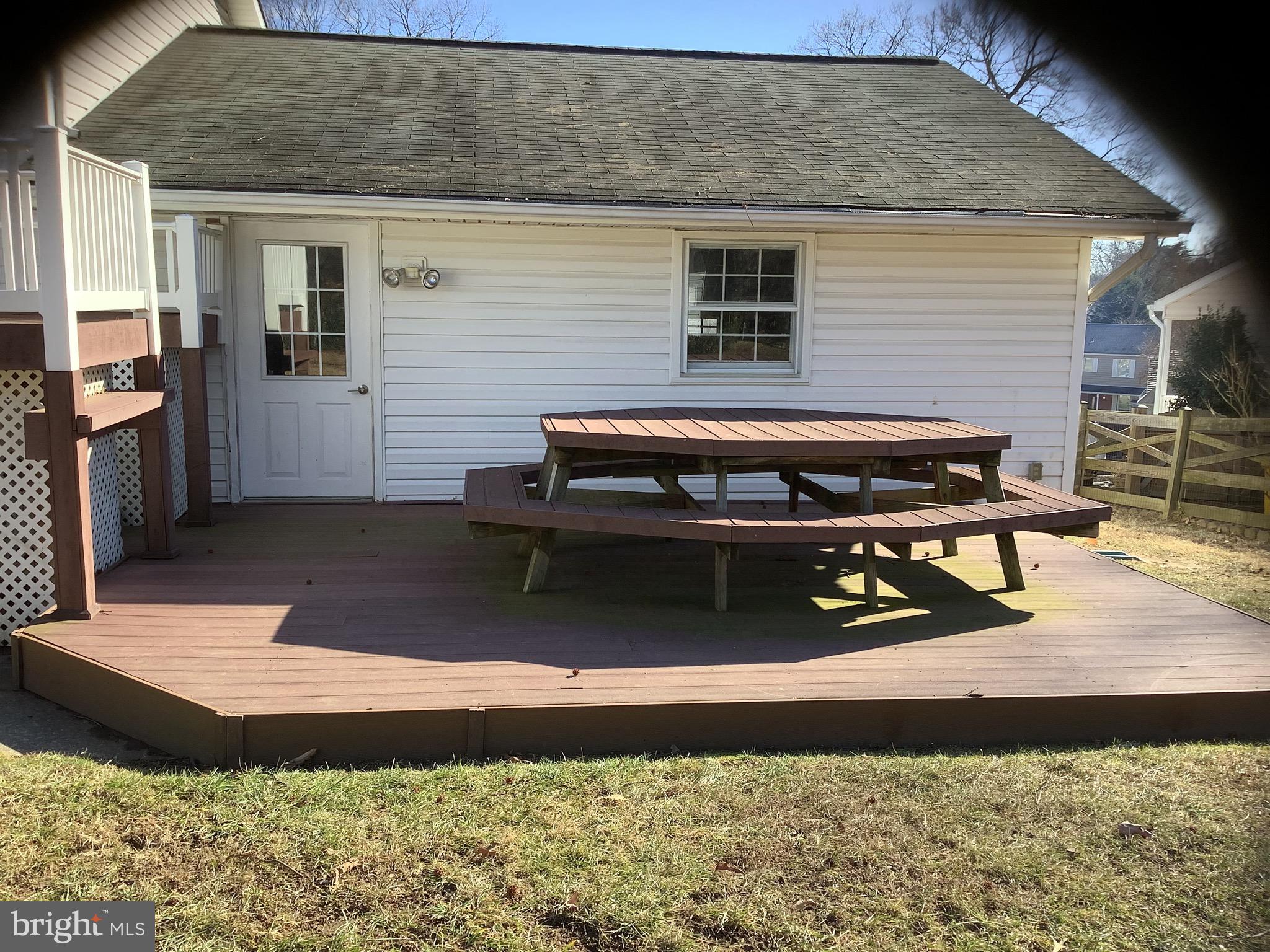 1574 Melanie Road Pasadena, MD 21122 - Photo 32 of 41 a view of a backyard with sitting area