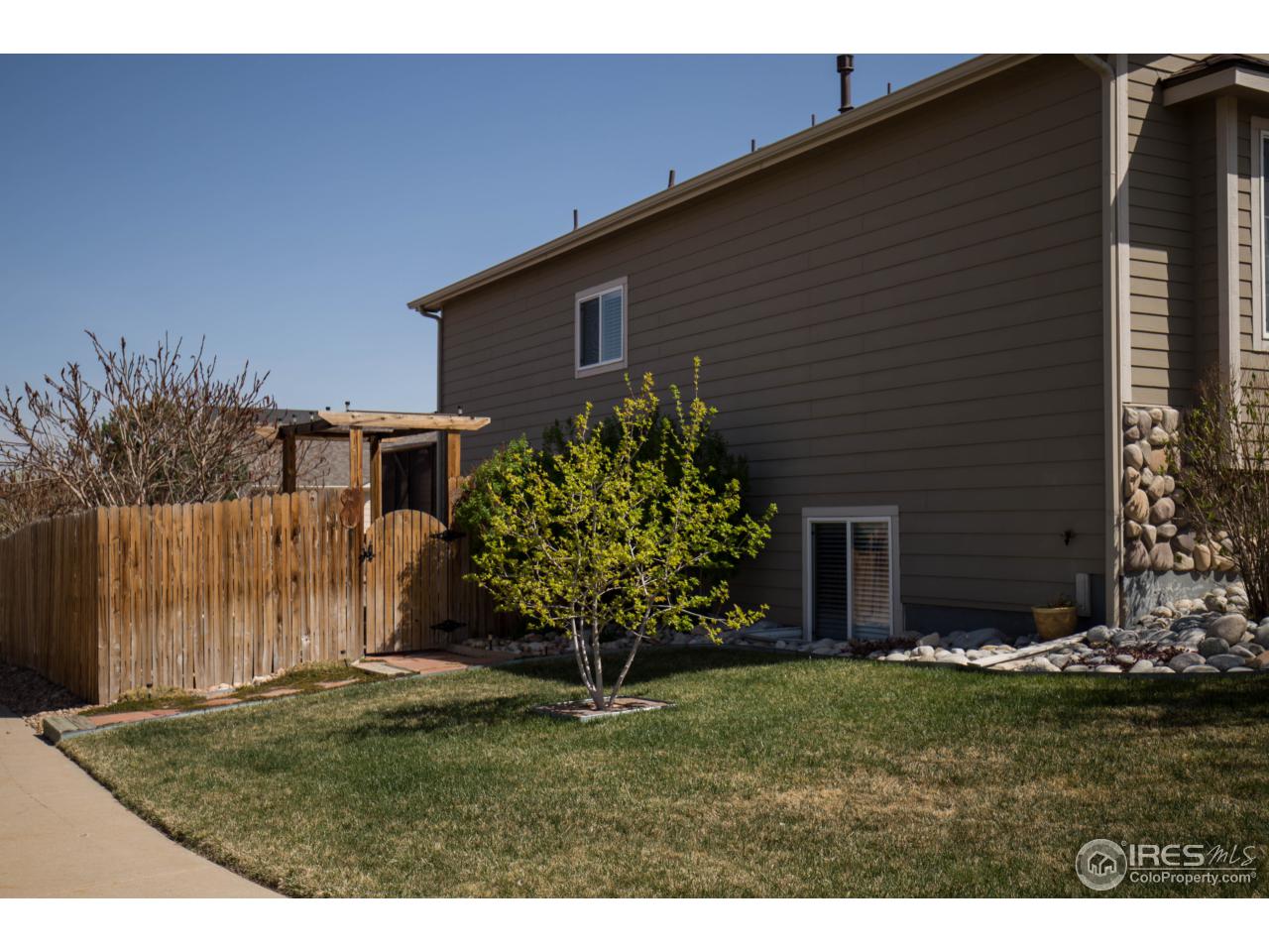 8811 19th St Road Greeley, CO 80634 - Photo 3 of 40 West side of home.