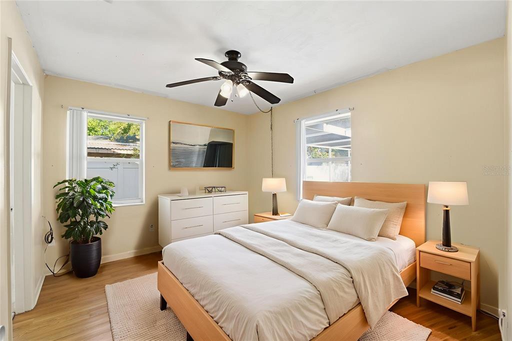 6229 Dalton Street Spring Hill, FL 34606 - Photo 18 of 44 a bedroom with a bed and a flat screen tv