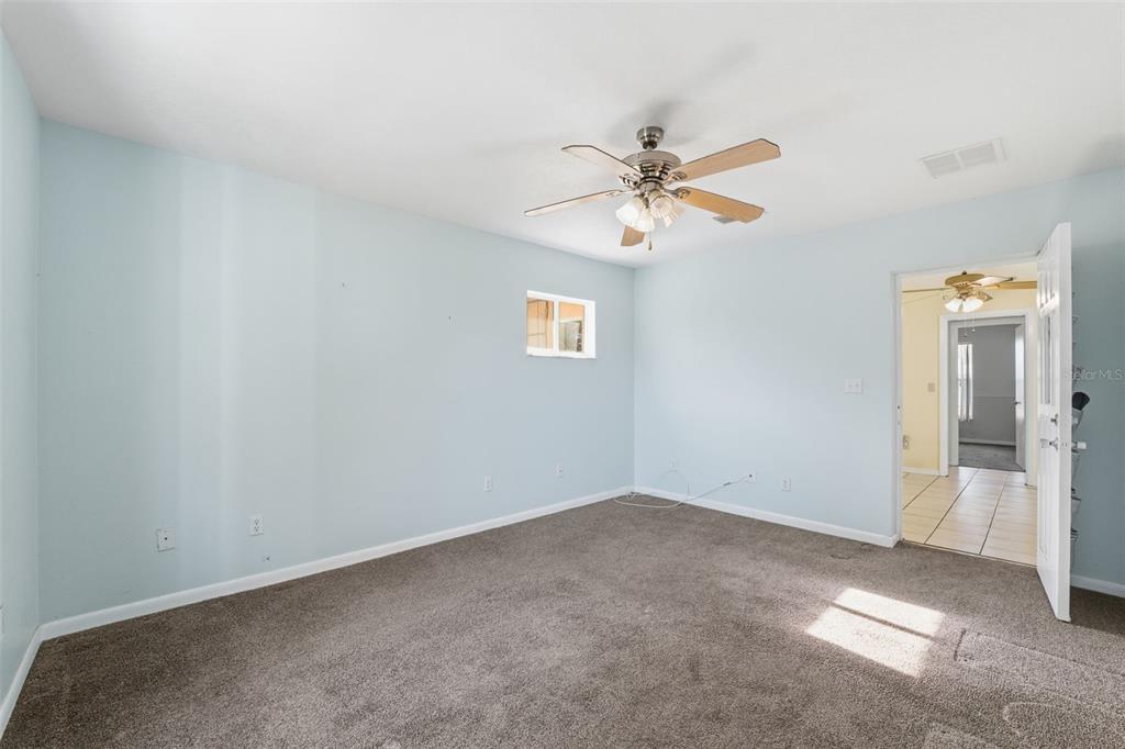 6229 Dalton Street Spring Hill, FL 34606 - Photo 24 of 44 wooden floor in an empty room with a window