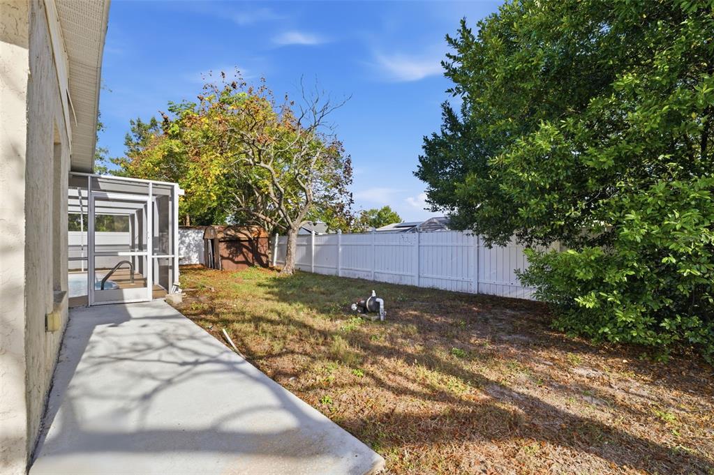 6229 Dalton Street Spring Hill, FL 34606 - Photo 29 of 44 a view of a backyard of the house